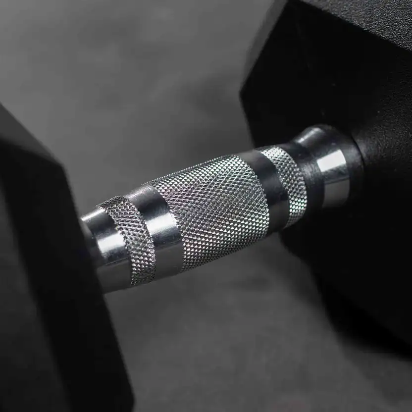 Massive dumbbell with textured grip for strength training and fitness workouts at Colorado Cardio gym.
