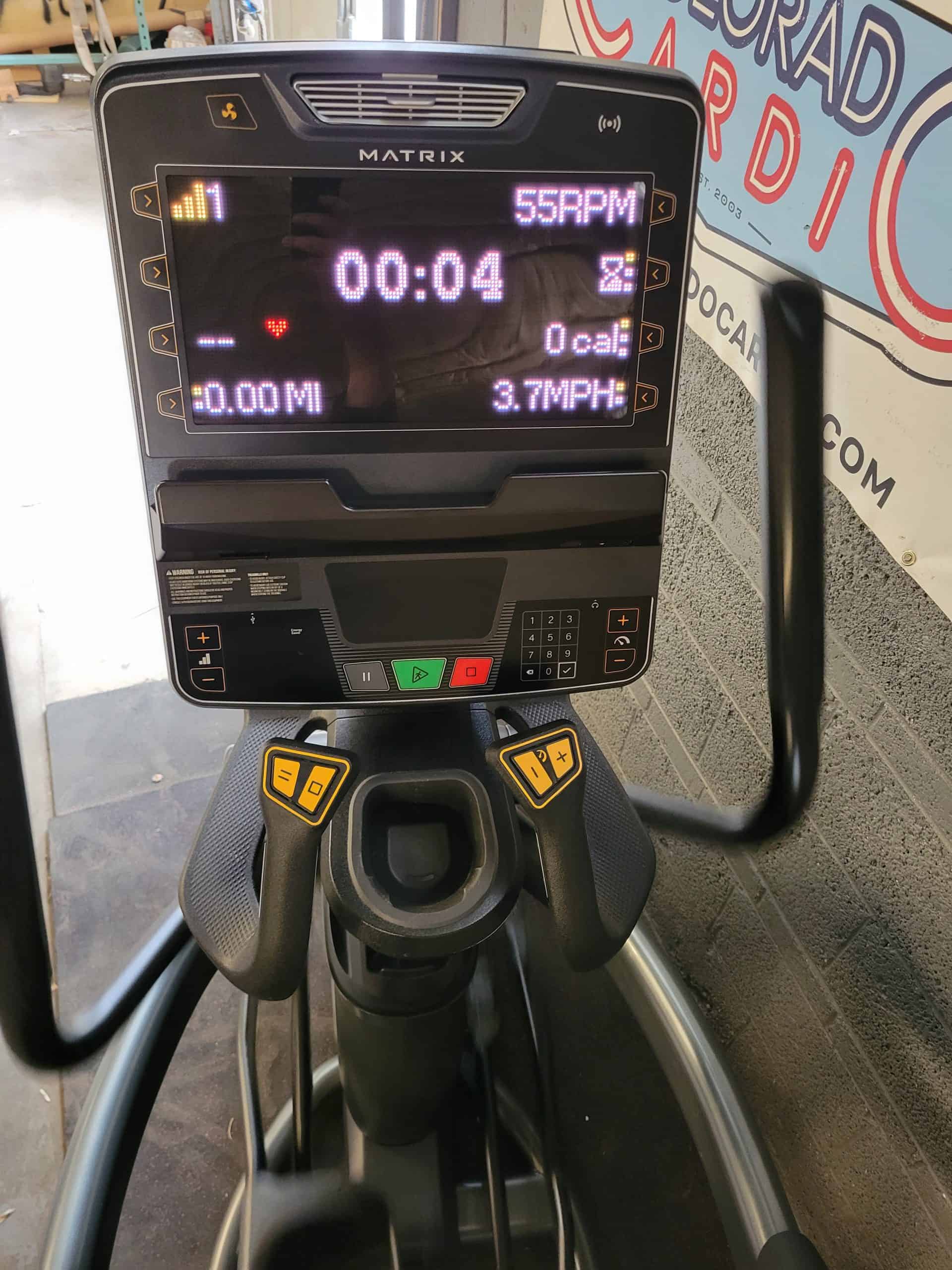 Exercise treadmill monitor at Colorado Cardio, displaying workout duration, speed, heart rate, and calories burned for cardiovascular health improvement.