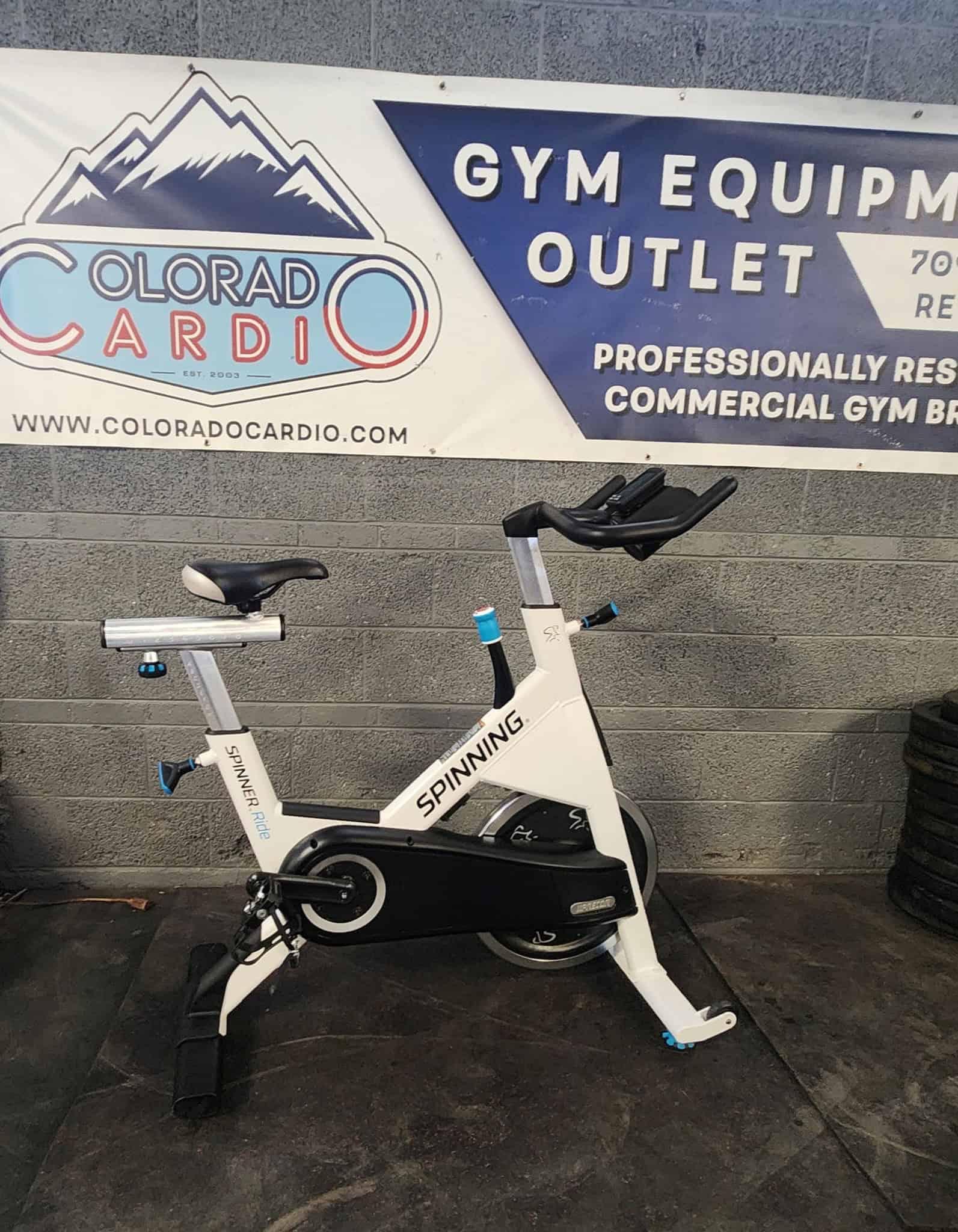 Indoor spinning bike at Colorado Cardio gym for cardiovascular fitness and heart health training.